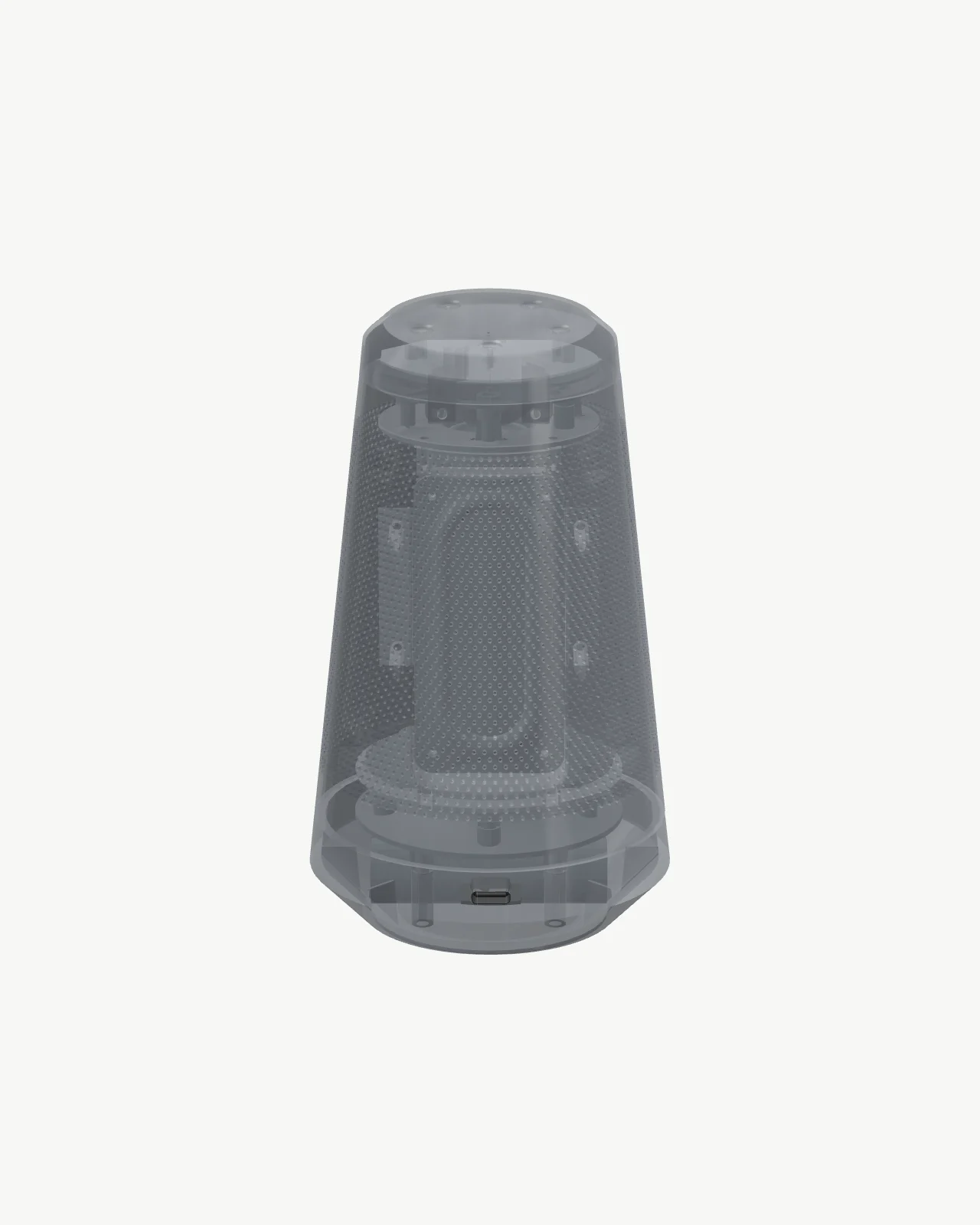 M-01 in translucent Graphite from the same angle, its passive radiator and chassis visible inside